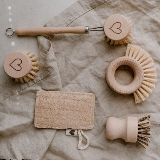 set with various wooden washing-up brushes and sponge