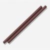 two brown silicone straws